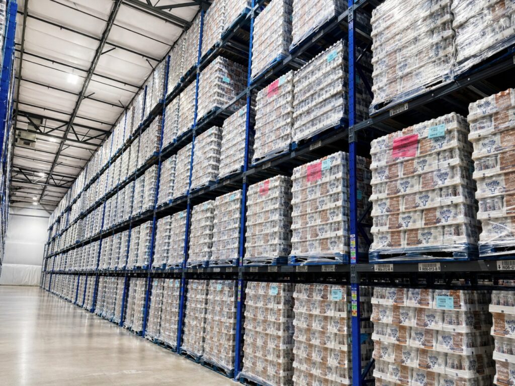 Fairlife dairy products stored on pallets in high-density warehouse racking within a controlled ambient logistics facility in Phoenix