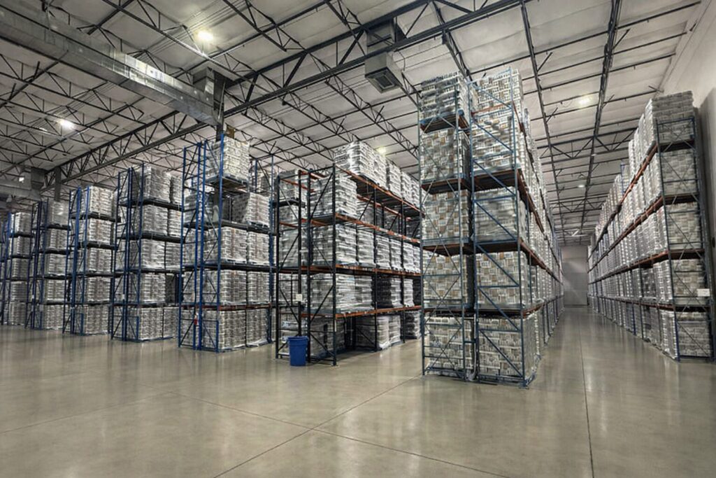 Medical device warehouse with temperature-controlled racking and palletized inventory at Dircks Logistics Phoenix facility